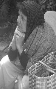 Wendy Westerwelle as Rose, remembering on a bench. Photo: Mark Larsen